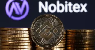 Representations of cryptocurrency Binance are seen in front of displayed Nobitex logo in this illustration taken November 3, 2022.