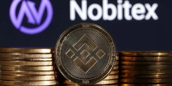 Representations of cryptocurrency Binance are seen in front of displayed Nobitex logo in this illustration taken November 3, 2022.