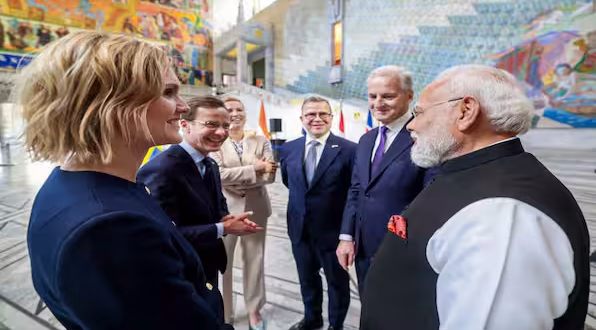 Prime Minister Narendra Modi with Norwegian Prime Minister Jonas Gahr Store, Finnish Prime Minister Petteri Orpo, Swedish Prime Minister Ulf Kristersson, Icelandic Prime Minister Kristrún Frostadóttir and Danish Prime Minister Mette Frederiksen during the Nordic-India Summit, in Oslo, Norway, May 19. (Image: PTI)