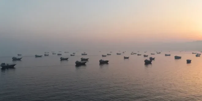 A drone view shows vessels in the Strait of Hormuz, as seen from Musandam, Oman, on 15 June. | Reuters