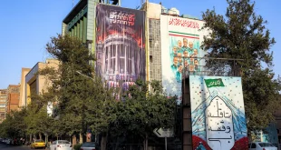 An anti-U.S. billboard featuring a burning White House is displayed on the facade of a building in Tehran’s Palestine Square this week. (AFP/Getty Images)
