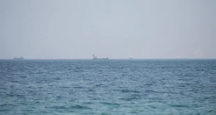 Vessels near the Strait of Hormuz, as seen from Musandam, Oman, August 6, 2026. | Stringer / REUTERS