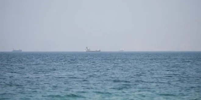 Vessels near the Strait of Hormuz, as seen from Musandam, Oman, August 6, 2026. | Stringer / REUTERS