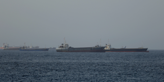 Commercial vessels and oil tankers preparing to transit through the Strait of Hormuz, one of the most critical strategic waterways for global trade flows, maintain their wait in the Gulf of Oman, on June 17, 2026. [Shady Alassar – Anadolu Agency]